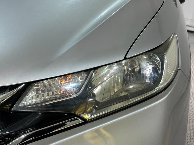 フィット 13G・F ETC スマートキー 電動格納ミラー MT 盗難防止システム 衝突安全ボディ ABS ESC CD エアコン パワーウインドウ パワーステアリング エアバッグ USB ミュージックプレイヤー接続可(22枚目)