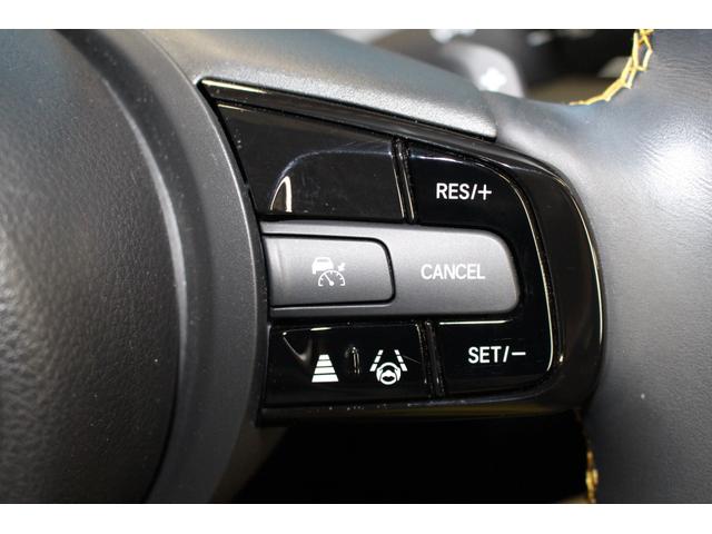 フィット ｅ：ＨＥＶ　ＲＳ　ホンダセンシング／禁煙／純正９インチナビ／バックカメラ／アダプティブクルーズ／寒冷地仕様／ＬＥＤヘッドライト／ハーフレザーシート／パドルシフト付／プッシュスタート／スマートキー／オートライト／（14枚目）
