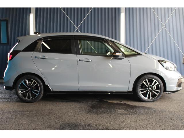 フィット ｅ：ＨＥＶ　ＲＳ　ホンダセンシング／禁煙／純正９インチナビ／バックカメラ／アダプティブクルーズ／寒冷地仕様／ＬＥＤヘッドライト／ハーフレザーシート／パドルシフト付／プッシュスタート／スマートキー／オートライト／（56枚目）