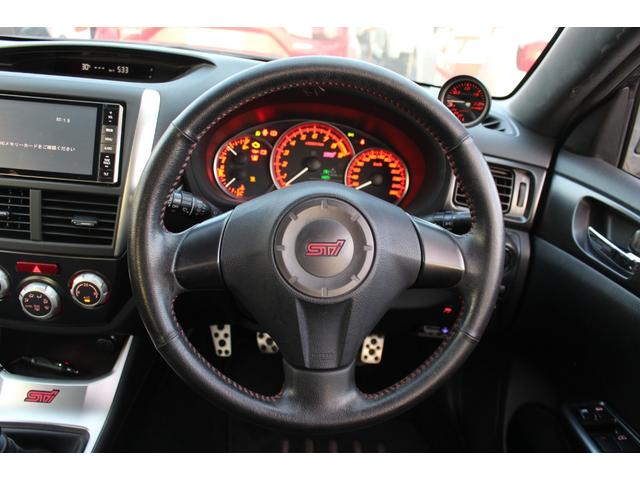 インプレッサ WRX STi 禁煙車/6速MT車/RECARO製バケットシート/大型リアスポイラー/STRADA製7インチナビ/STI18インチアルミホイール/4WD/ターボ/HIDヘッドライト/プッシュスタート/ETC/(16枚目)