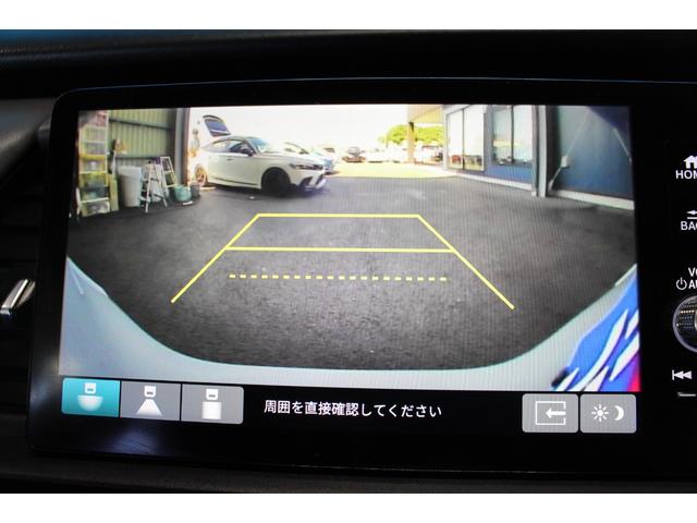 フィット ｅ：ＨＥＶ　ＲＳ　禁煙車／ホンダセンシング／純正９インチナビ／ハーフレザーシート／バックカメラ／ＥＮＫＥＩ１６インチホイール／クリアランスソナー／レーダークルーズコントロール／レーンキープアシスト／ＬＥＤヘッドライト（9枚目）