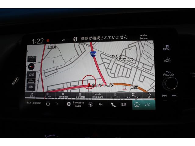 フィット ｅ：ＨＥＶ　ＲＳ　禁煙車／ホンダセンシング／純正９インチナビ／ハーフレザーシート／バックカメラ／ＥＮＫＥＩ１６インチホイール／クリアランスソナー／レーダークルーズコントロール／レーンキープアシスト／ＬＥＤヘッドライト（10枚目）