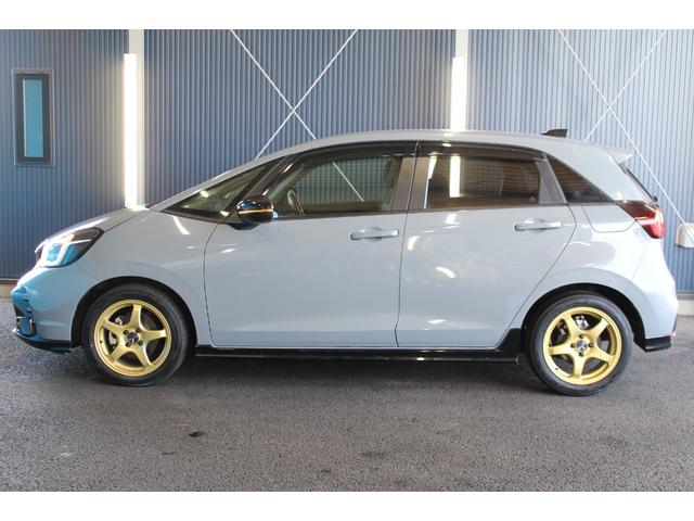 フィット ｅ：ＨＥＶ　ＲＳ　禁煙車／ホンダセンシング／純正９インチナビ／ハーフレザーシート／バックカメラ／ＥＮＫＥＩ１６インチホイール／クリアランスソナー／レーダークルーズコントロール／レーンキープアシスト／ＬＥＤヘッドライト（33枚目）