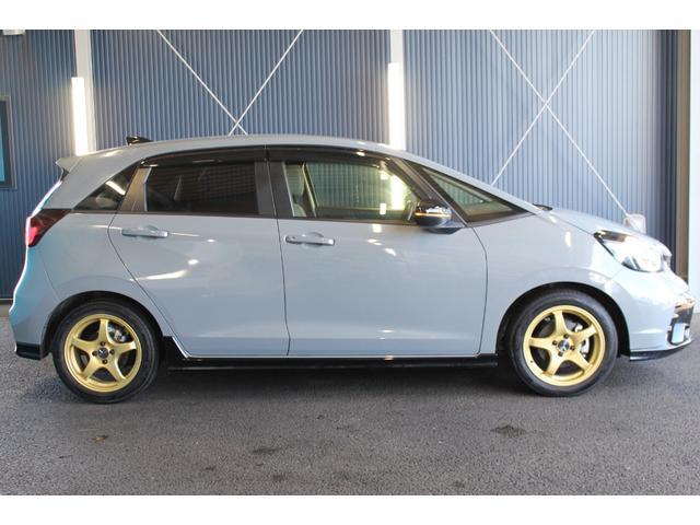 フィット ｅ：ＨＥＶ　ＲＳ　禁煙車／ホンダセンシング／純正９インチナビ／ハーフレザーシート／バックカメラ／ＥＮＫＥＩ１６インチホイール／クリアランスソナー／レーダークルーズコントロール／レーンキープアシスト／ＬＥＤヘッドライト（34枚目）