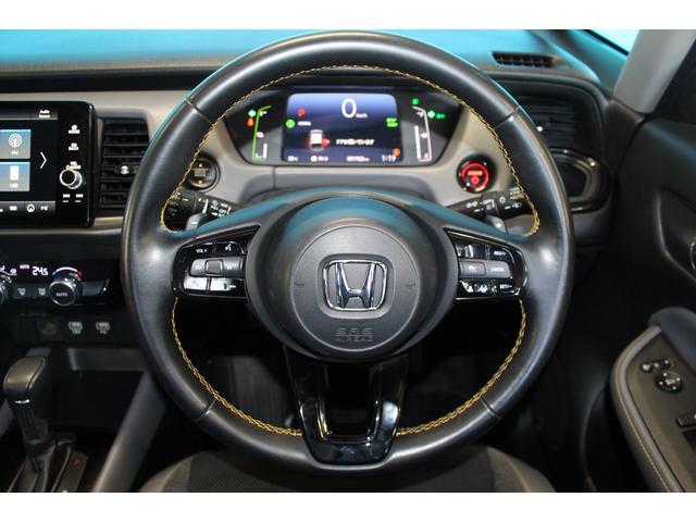 フィット ｅ：ＨＥＶ　ＲＳ　禁煙車／ホンダセンシング／純正９インチナビ／ハーフレザーシート／バックカメラ／ＥＮＫＥＩ１６インチホイール／クリアランスソナー／レーダークルーズコントロール／レーンキープアシスト／ＬＥＤヘッドライト（54枚目）