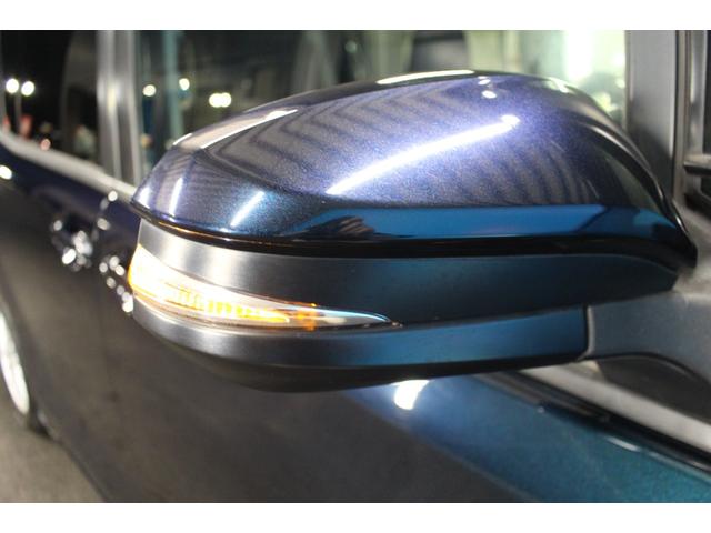 ヴォクシー ハイブリッドＶ　禁煙車／後席モニター／ウォークスルー／純正９インチナビ／バックカメラ／フルセグ／両側パワースライドドア／クルーズコントロール／シートヒーター／純正１５ＡＷ／ワイヤレス充電／ブルートゥース接続／ＥＴＣ（29枚目）