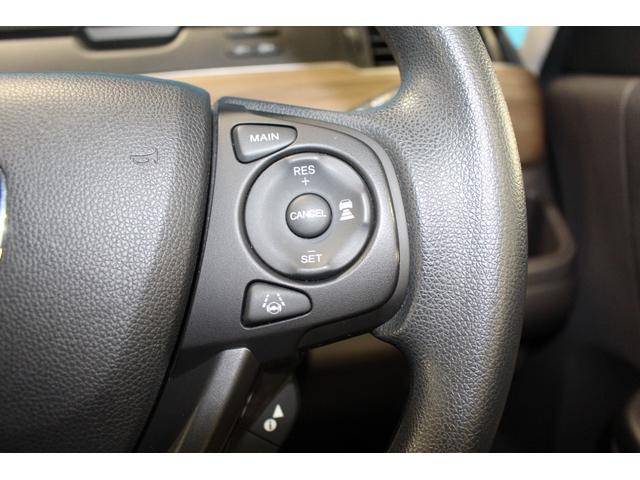 フリードハイブリッド ハイブリッド・Ｇホンダセンシング　禁煙車／後期型／１オーナー／Ｃパッケージ／ホンダセンシング／両側電動スライドドア／レーダークルーズコントロール／レーンアシスト／クリアランソナー／オートマチックハイビーム／ウォークスルー／寒冷地仕様（13枚目）