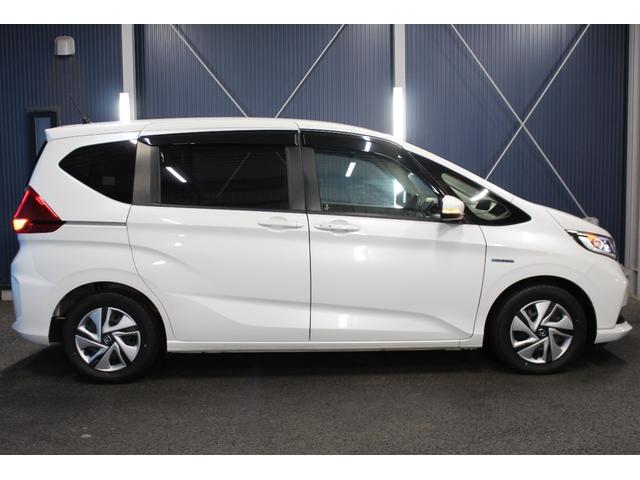 フリードハイブリッド ハイブリッド・Ｇホンダセンシング　禁煙車／後期型／１オーナー／Ｃパッケージ／ホンダセンシング／両側電動スライドドア／レーダークルーズコントロール／レーンアシスト／クリアランソナー／オートマチックハイビーム／ウォークスルー／寒冷地仕様（50枚目）