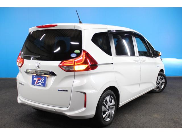 フリードハイブリッド ハイブリッド・Ｇホンダセンシング　禁煙車／後期型／１オーナー／Ｃパッケージ／ホンダセンシング／両側電動スライドドア／レーダークルーズコントロール／レーンアシスト／クリアランソナー／オートマチックハイビーム／ウォークスルー／寒冷地仕様（52枚目）