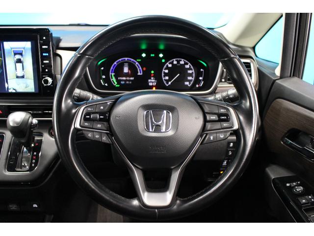 オデッセイハイブリッド ｅ：ＨＥＶアブソルート・ＥＸ　純正９インチナビ／全周囲カメラ／禁煙／両側電動スライドドア／ホンダセンシング／パワーバックドア／シートヒーター／アダプティブクルーズコントロール／ドラレコ／ＬＥＤヘッドライト／ＨＤＭＩ接続／ＥＴＣ／（32枚目）