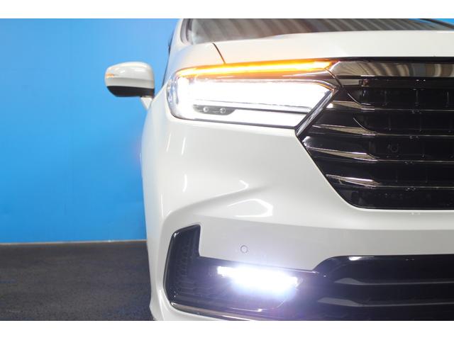 オデッセイハイブリッド ｅ：ＨＥＶアブソルート・ＥＸ　純正９インチナビ／全周囲カメラ／禁煙／両側電動スライドドア／ホンダセンシング／パワーバックドア／シートヒーター／アダプティブクルーズコントロール／ドラレコ／ＬＥＤヘッドライト／ＨＤＭＩ接続／ＥＴＣ／（68枚目）