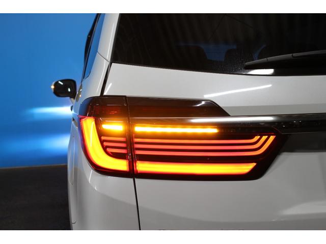 オデッセイハイブリッド ｅ：ＨＥＶアブソルート・ＥＸ　純正９インチナビ／全周囲カメラ／禁煙／両側電動スライドドア／ホンダセンシング／パワーバックドア／シートヒーター／アダプティブクルーズコントロール／ドラレコ／ＬＥＤヘッドライト／ＨＤＭＩ接続／ＥＴＣ／（74枚目）