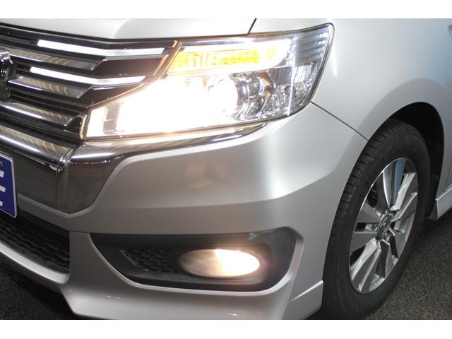 ステップワゴンスパーダ Ｚ　純正９インチナビ／両側電動スライドドア／禁煙／バックカメラ／コンフォートビューＰｋｇ／パドルシフト／ステアリングリモコン／ＨＩＤヘッドライト／アイドリングストップ／３列シート／純正１６インチＡＷ／（56枚目）