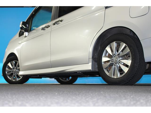 ステップワゴンスパーダ Ｚ　純正９インチナビ／両側電動スライドドア／禁煙／バックカメラ／コンフォートビューＰｋｇ／パドルシフト／ステアリングリモコン／ＨＩＤヘッドライト／アイドリングストップ／３列シート／純正１６インチＡＷ／（65枚目）