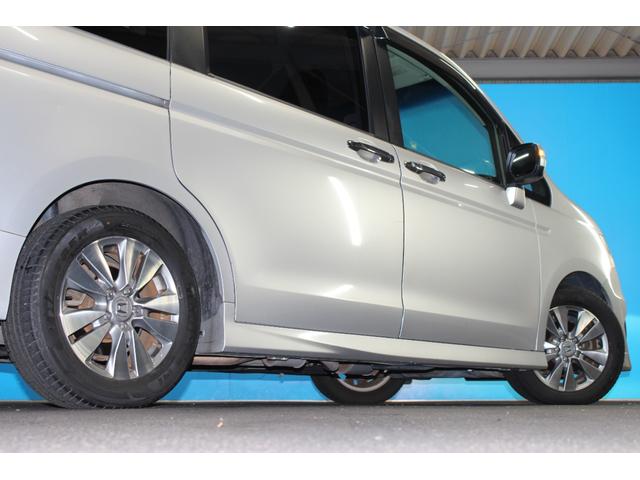 ステップワゴンスパーダ Ｚ　純正９インチナビ／両側電動スライドドア／禁煙／バックカメラ／コンフォートビューＰｋｇ／パドルシフト／ステアリングリモコン／ＨＩＤヘッドライト／アイドリングストップ／３列シート／純正１６インチＡＷ／（66枚目）