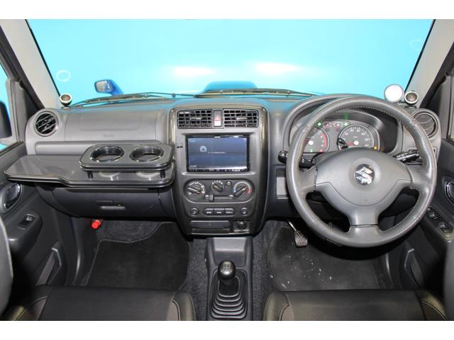 ジムニー クロスアドベンチャー　禁煙車／８型／リフトアップ／社外テールランプ／社外ナビ７型／シートヒーター／ターボタイマー／バックカメラ／４ＷＤ／ＥＴＣ／キーレス／スマートキー／ブルートゥース／電動格納ミラー／ＤＶＤ／寒冷地仕様（6枚目）