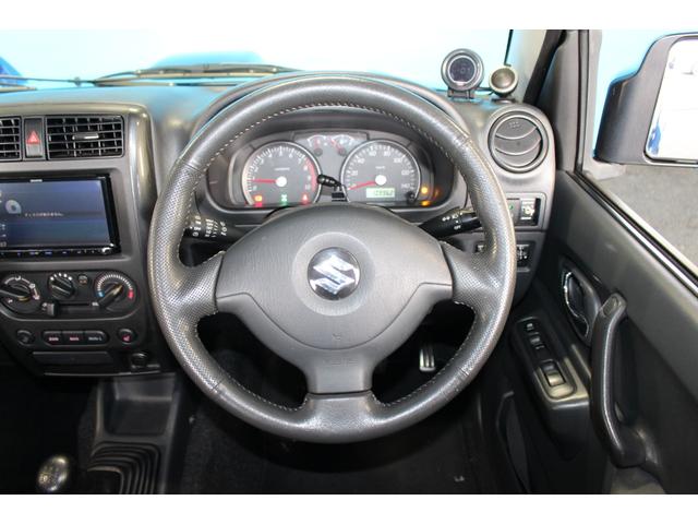 ジムニー クロスアドベンチャー　禁煙車／８型／リフトアップ／社外テールランプ／社外ナビ７型／シートヒーター／ターボタイマー／バックカメラ／４ＷＤ／ＥＴＣ／キーレス／スマートキー／ブルートゥース／電動格納ミラー／ＤＶＤ／寒冷地仕様（18枚目）