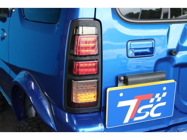 ジムニー クロスアドベンチャー　禁煙車／８型／リフトアップ／社外テールランプ／社外ナビ７型／シートヒーター／ターボタイマー／バックカメラ／４ＷＤ／ＥＴＣ／キーレス／スマートキー／ブルートゥース／電動格納ミラー／ＤＶＤ／寒冷地仕様（19枚目）