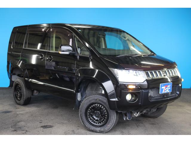 デリカＤ：５ Ｄ　パワーパッケージ　禁煙車／ＡＬＰＩＮＥ製後席モニター／ＡＬＰＩＮＥ製９インチナビ／バックカメラ／リフトアップ／オーバーフェンダー／構造変更済み／レザー調シートカバー／両側パワースライドドア／ＨＩＤヘッドライト／ＥＴＣ（57枚目）