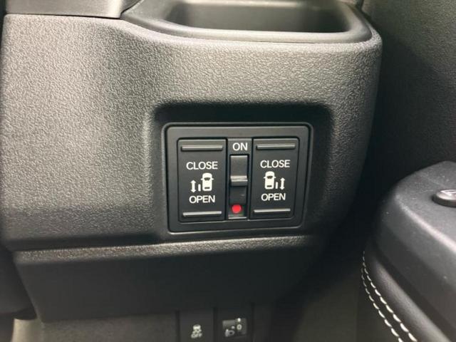 N-BOXカスタム 4WDコーディネートスタイル2トーン 保証書/純正 9インチ SDナビ/両側電動スライドドア/シートヒーター/車線逸脱防止支援システム/シート ハーフレザー/ヘッドランプ LED/USBジャック/Bluetooth接続/ETC 4WD(27枚目)