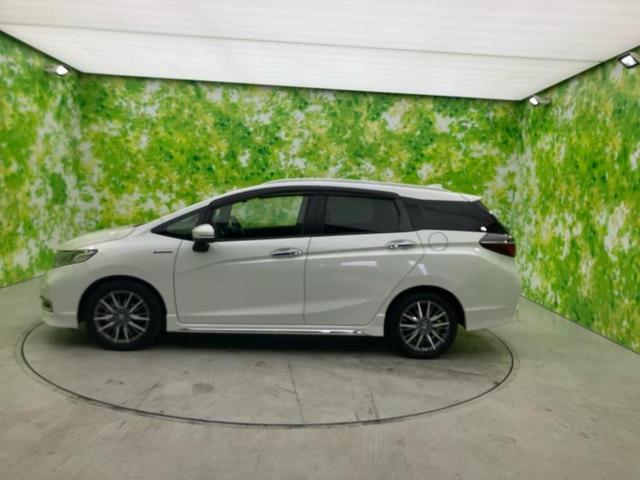 シャトル ハイブリッドZ・ホンダセンシング 新品タイヤ/保証書/純正 8インチ SDナビ/シートヒーター/シート ハーフレザー/ヘッドランプ LED/ETC/EBD付ABS/横滑り防止装置/アイドリングストップ/バックモニター/フルセグTV(2枚目)