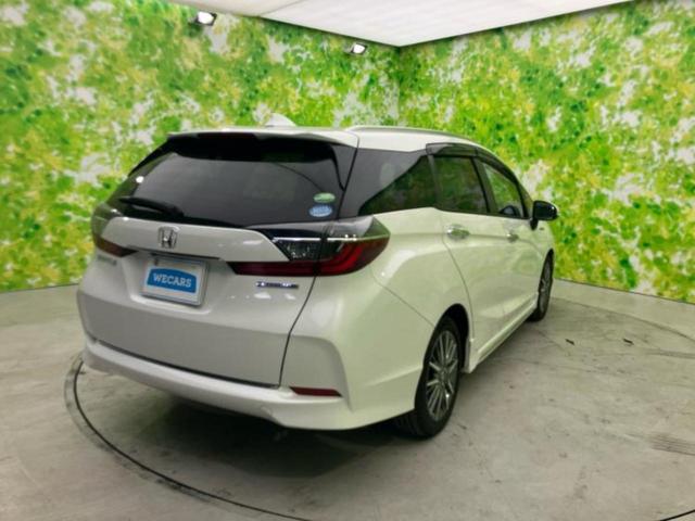 シャトル ハイブリッドZ・ホンダセンシング 新品タイヤ/保証書/純正 8インチ SDナビ/シートヒーター/シート ハーフレザー/ヘッドランプ LED/ETC/EBD付ABS/横滑り防止装置/アイドリングストップ/バックモニター/フルセグTV(3枚目)