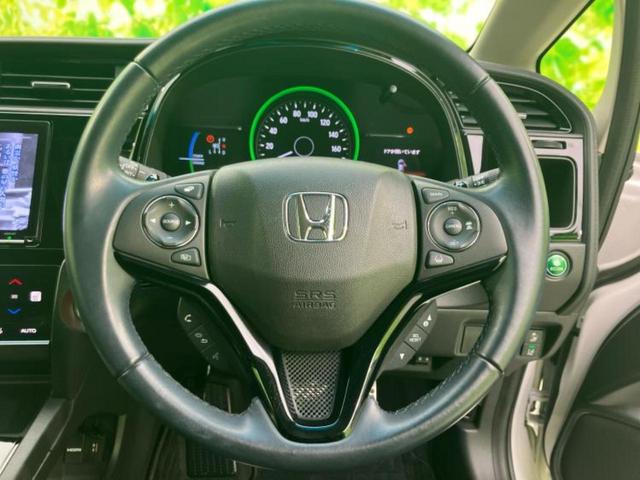 シャトル ハイブリッドZ・ホンダセンシング 新品タイヤ/保証書/純正 8インチ SDナビ/シートヒーター/シート ハーフレザー/ヘッドランプ LED/ETC/EBD付ABS/横滑り防止装置/アイドリングストップ/バックモニター/フルセグTV(16枚目)