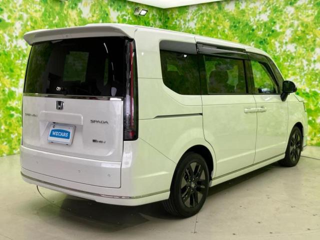 ステップワゴン ｅＨＥＶスパーダ　新品タイヤ／純正　１１．６インチ　ＳＤナビ／フリップダウンモニター／衝突安全装置／両側電動スライドドア／シートヒーター／車線逸脱防止支援システム／シート　ハーフレザー／電動バックドア　バックカメラ（3枚目）