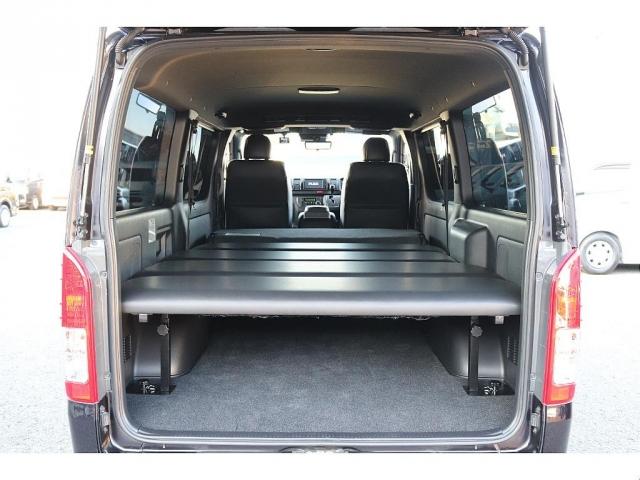 ハイエースバン スーパーＧＬ　ダークプライムＩＩ　トヨタ純正ＳＤナビ　バックカメラ　ＥＴＣ　ドライブレコーダー前後　ＴＲＤフロントスポイラー　ＴＲＤマッドガード　ＴＲＤサイドスカート　ＴＯＹＯオープンカントリーＡＴ１５インチ　トヨタ純正アルミホイール（5枚目）