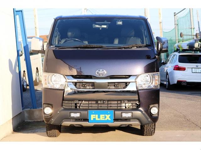 ハイエースバン スーパーＧＬ　ダークプライムＩＩ　トヨタ純正ＳＤナビ　バックカメラ　ＥＴＣ　ドライブレコーダー前後　ＴＲＤフロントスポイラー　ＴＲＤマッドガード　ＴＲＤサイドスカート　ＴＯＹＯオープンカントリーＡＴ１５インチ　トヨタ純正アルミホイール（6枚目）