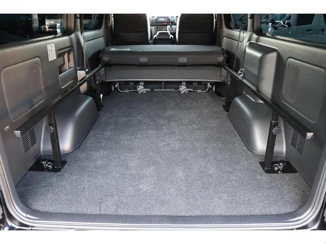 ハイエースバン スーパーＧＬ　ダークプライムＩＩ　トヨタ純正ＳＤナビ　バックカメラ　ＥＴＣ　ドライブレコーダー前後　ＴＲＤフロントスポイラー　ＴＲＤマッドガード　ＴＲＤサイドスカート　ＴＯＹＯオープンカントリーＡＴ１５インチ　トヨタ純正アルミホイール（19枚目）