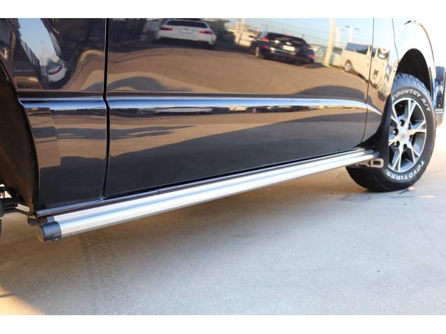 ハイエースバン スーパーＧＬ　ダークプライムＩＩ　トヨタ純正ＳＤナビ　バックカメラ　ＥＴＣ　ドライブレコーダー前後　ＴＲＤフロントスポイラー　ＴＲＤマッドガード　ＴＲＤサイドスカート　ＴＯＹＯオープンカントリーＡＴ１５インチ　トヨタ純正アルミホイール（26枚目）