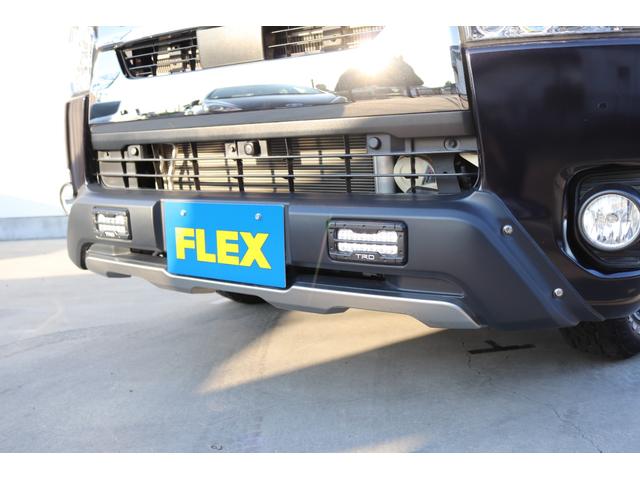 ハイエースバン スーパーＧＬ　ダークプライムＩＩ　トヨタ純正ＳＤナビ　バックカメラ　ＥＴＣ　ドライブレコーダー前後　ＴＲＤフロントスポイラー　ＴＲＤマッドガード　ＴＲＤサイドスカート　ＴＯＹＯオープンカントリーＡＴ１５インチ　トヨタ純正アルミホイール（27枚目）