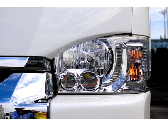 ハイエースワゴン GL トヨタ純正SDナビ フルセグTV 後席フリップダウンモニター バットフェイスボンネット パワースライドド シートカバー トヨタ純正アルミホイール LEDヘッドライト プッシュスタート スマートキー(29枚目)