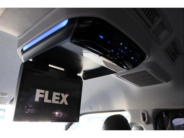 レジアスエースバン ロングワイドスーパーGL フローリング施工 バタフライセカンドシート ベットキット 防虫ネット ルームキャリア シートカバー イクリプスナビ 後席フリップダウンモニター ETC インナーブラックヘッドライト(11枚目)