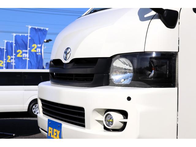 レジアスエースバン ロングワイドスーパーGL フローリング施工 バタフライセカンドシート ベットキット 防虫ネット ルームキャリア シートカバー イクリプスナビ 後席フリップダウンモニター ETC インナーブラックヘッドライト(28枚目)