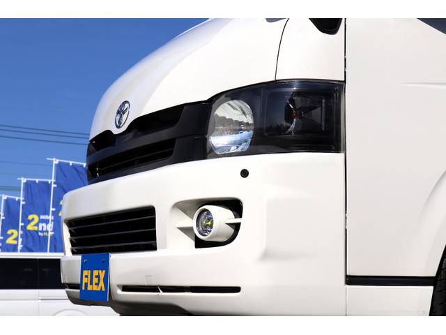 レジアスエースバン ロングワイドスーパーGL フローリング施工 バタフライセカンドシート ベットキット 防虫ネット ルームキャリア シートカバー イクリプスナビ 後席フリップダウンモニター ETC インナーブラックヘッドライト(29枚目)