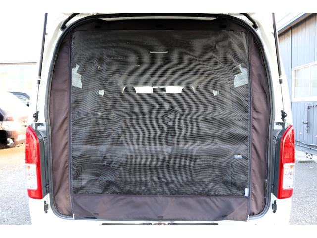 レジアスエースバン ロングワイドスーパーGL フローリング施工 バタフライセカンドシート ベットキット 防虫ネット ルームキャリア シートカバー イクリプスナビ 後席フリップダウンモニター ETC インナーブラックヘッドライト(38枚目)