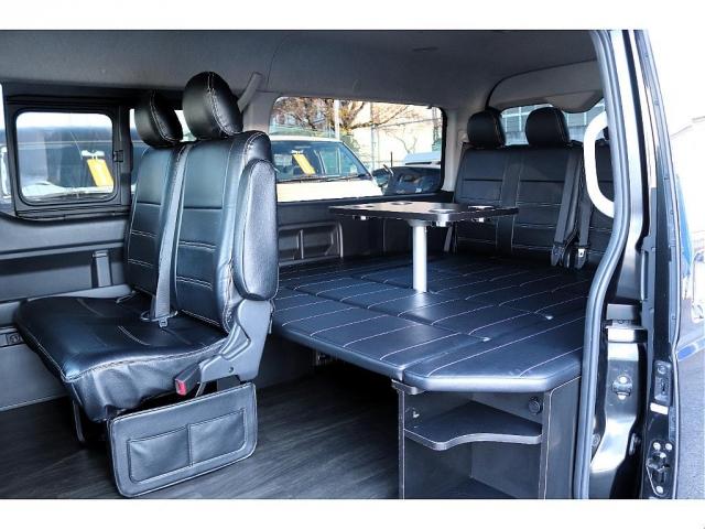 ハイエースワゴン ＧＬ　内装架装（ベッドキット・テーブル・フローリング）／フリッピダウンモニター／ドライブレコーダー／パイオニア７型ナビ／ＥＴＣ／バックカメラ／リアスピーカー／ローダウン／バックカメラ／助手席エアバック（5枚目）