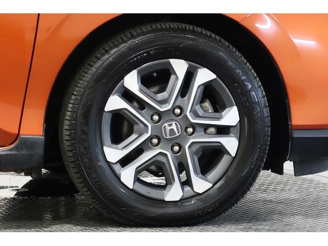 フリード+ クロスター・ホンダセンシング ホンダ認定中古車 1年保証 運転支援 衝突軽減ブレーキ ホンダセンシング 9インチナビ 安心プラス ETC アルミホイール 両側パワースライドドア LEDヘッドライト シートヒーター イモビ ACC(25枚目)