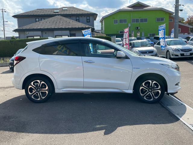 ヴェゼル ハイブリッドZ・ホンダセンシング【4WD】 7インチメモリーナビ Bluetooth フルセグ バックカメラ ドラレコ ETC 追従型クルコン ハーフレザー コーナーセンサー 衝突軽減 車線逸脱警告 スマートキー 純正アルミ LED 禁煙車(57枚目)