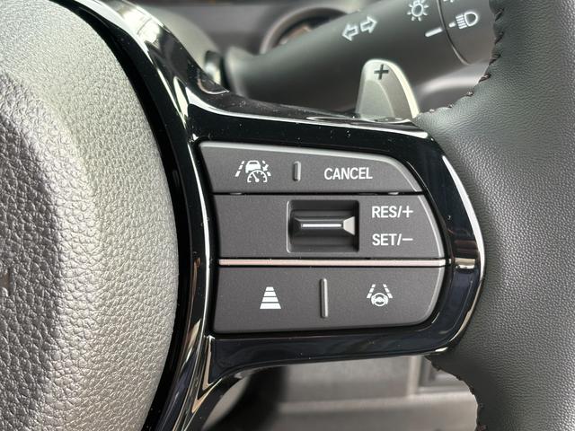 Ｎ－ＢＯＸカスタム ターボ【４ＷＤ】【届出済未使用車】【純正８インチナビ】　【衝突軽減＆レーンアシスト】レーダークルコン　両側電動スライドドア　コーナーセンサー　フルセグ　バックカメラ　Ｂｌｕｅｔｏｏｔｈ再生　シートヒーター　ハーブレザーシート　ＬＥＤオートライト　純正アルミ（9枚目）