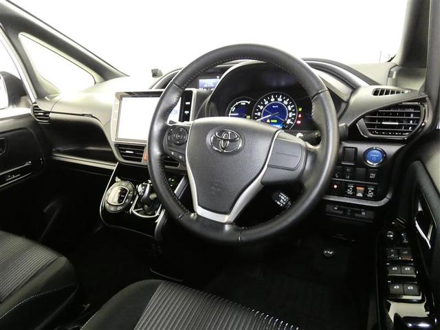 ヴォクシー ハイブリッドＺＳ　煌ＩＩ　フルセグ　メモリーナビ　後席モニター　バックカメラ　ドラレコ　衝突被害軽減システム　ＥＴＣ　両側電動スライド　ＬＥＤヘッドランプ　３列シート　ＤＶＤ再生　記録簿　乗車定員７人　安全装備　ナビ＆ＴＶ（4枚目）