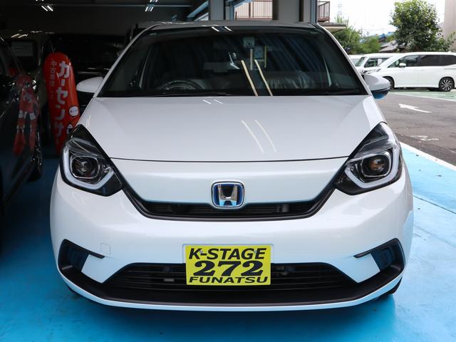 フィット ｅ：ＨＥＶベーシック　●令和３年式　●走行・２９３５１Ｋｍ　●ナビ　●ＥＴＣ　●バックカメラ　●ＬＥＤヘッドライト　●電子制御パーキングブレーキ　●オートエアコン　●ハイブリッド　●レンタカーＵＰ　●ホンダセンシングレス（2枚目）