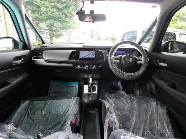 フィット ｅ：ＨＥＶベーシック　●令和３年式　●走行・２９３５１Ｋｍ　●ナビ　●ＥＴＣ　●バックカメラ　●ＬＥＤヘッドライト　●電子制御パーキングブレーキ　●オートエアコン　●ハイブリッド　●レンタカーＵＰ　●ホンダセンシングレス（10枚目）