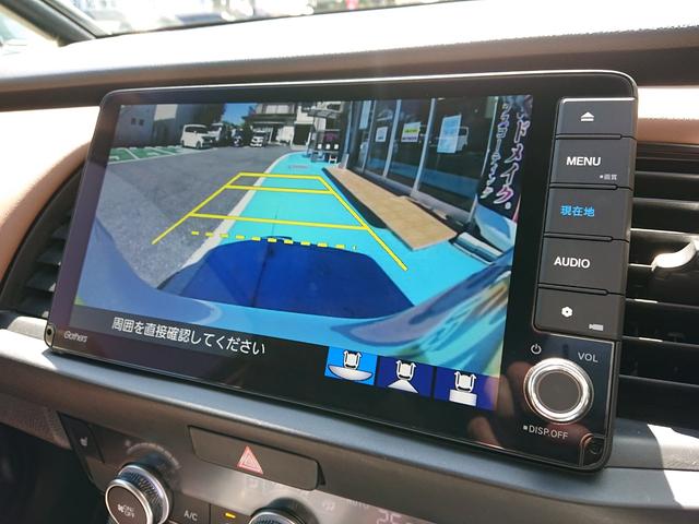 フィット ｅ：ＨＥＶリュクス　●令和３年式　●走行・２０１２６Ｋｍ　●純正９インチプレミアムインターナビ　●ＥＴＣ　●バックカメラ　●純正前後ドラレコ　●電子パーキング　●ＡＣＣ　●衝突軽減ブレーキ　●Ｆシートヒーター　●禁煙車（7枚目）