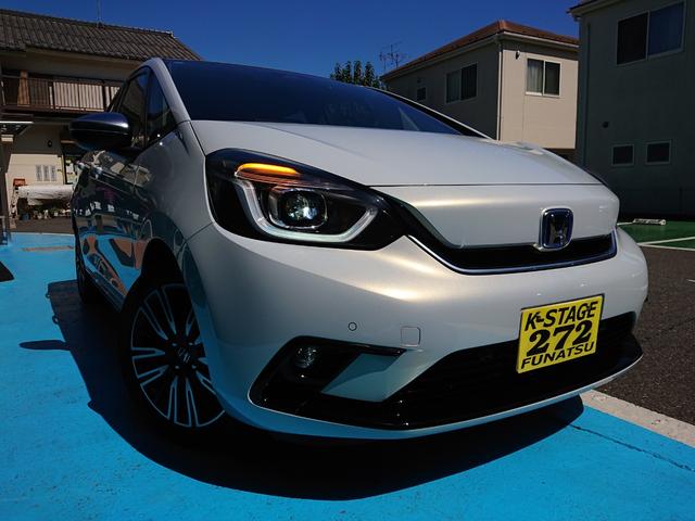 フィット ｅ：ＨＥＶリュクス　●令和３年式　●走行・２０１２６Ｋｍ　●純正９インチプレミアムインターナビ　●ＥＴＣ　●バックカメラ　●純正前後ドラレコ　●電子パーキング　●ＡＣＣ　●衝突軽減ブレーキ　●Ｆシートヒーター　●禁煙車（34枚目）