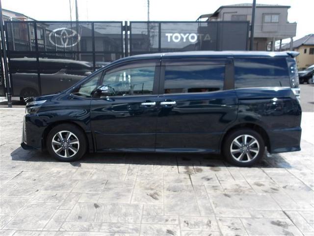 ヴォクシー ＺＳ　煌　地上デジタル　ＴＳＳ　両側パワードア　アイドリングストップ車　パワーウィンド　横滑防止　１オーナ　整備記録簿　ＤＶＤ可　フルフラットシート　盗難防止装置　スマートエントリー　Ｂカメラ　メモリーナビ（4枚目）