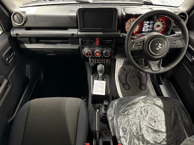 ジムニー ＸＣ　登録届出済未使用車・スズキセーフティサポート・車線逸脱警報・リヤパーキングセンサー・ＬＥＤヘッドライト・シートヒーター・フォグランプ・純正１６ｉｎアルミ・スマートキー（13枚目）