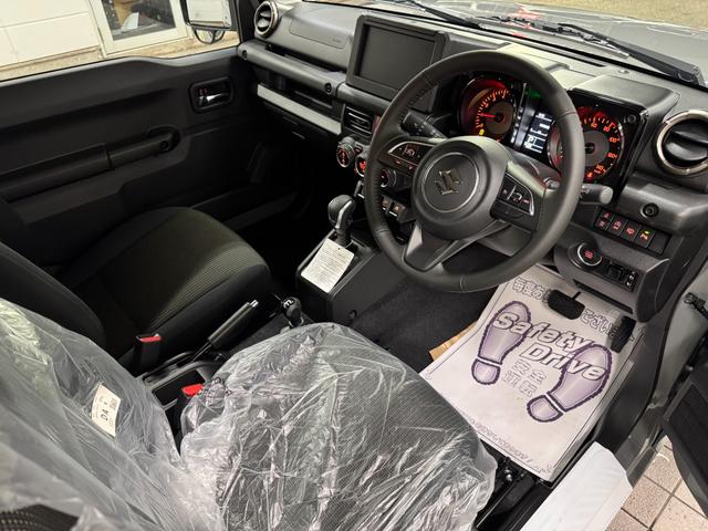 ジムニー ＸＣ　登録届出済未使用車・スズキセーフティサポート・車線逸脱警報・リヤパーキングセンサー・ＬＥＤヘッドライト・シートヒーター・フォグランプ・純正１６ｉｎアルミ・スマートキー（23枚目）